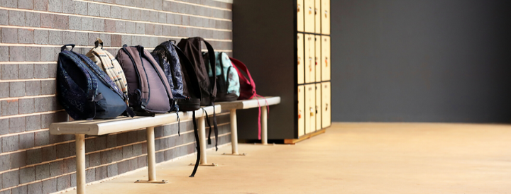 High School student school bags outside the classroom at an educational facility