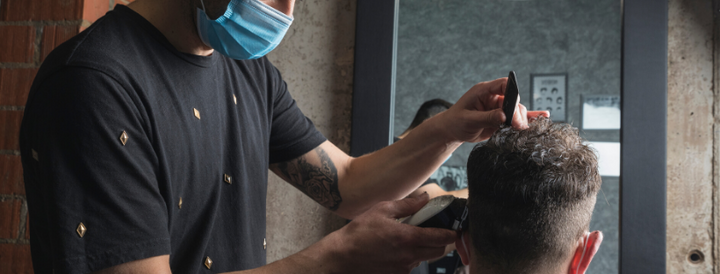 Hairdresser wearing a mask 