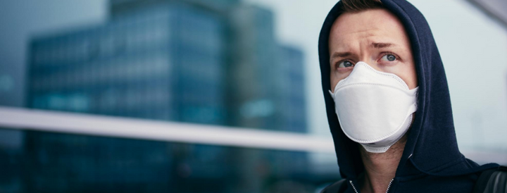 Man with a mask at the airport