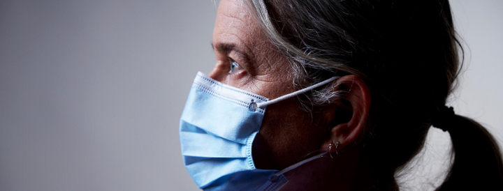 Nurse wearing a surgical face mask